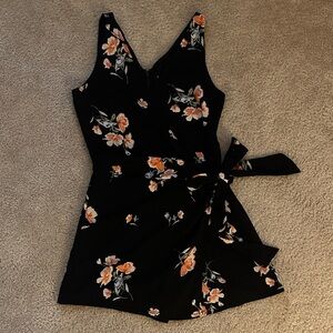 Nanamacs Boutique Sugarlips Black sleeveless  Floral Wrap Front Romper